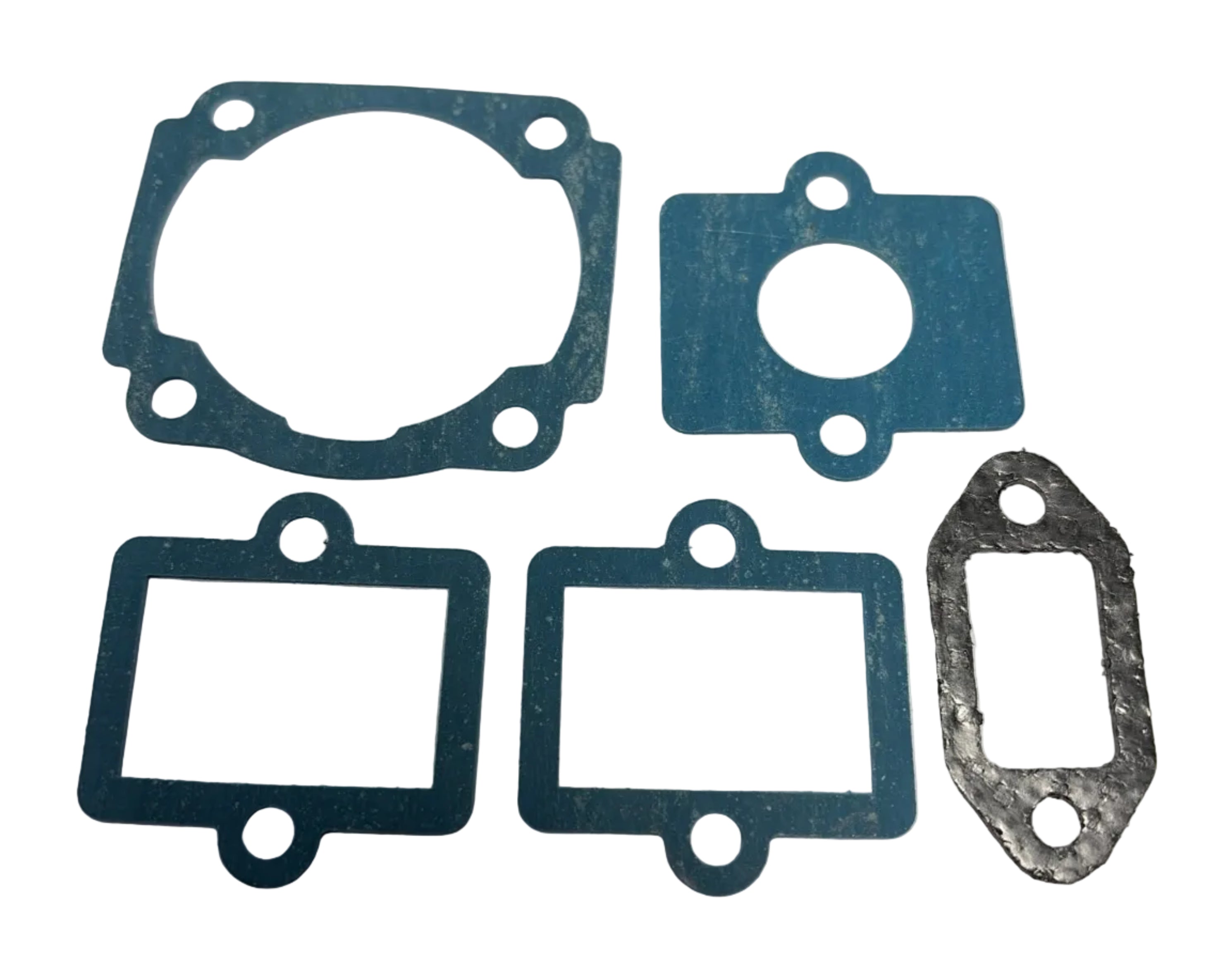 Set of gaskets on a metallic surface. 35cc Parts for Stinger Engines