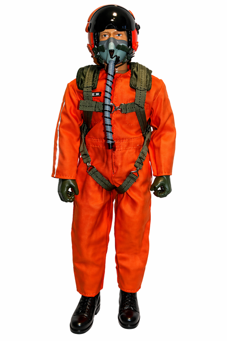 Person wearing an orange flight suit with a helmet and oxygen mask on a white background