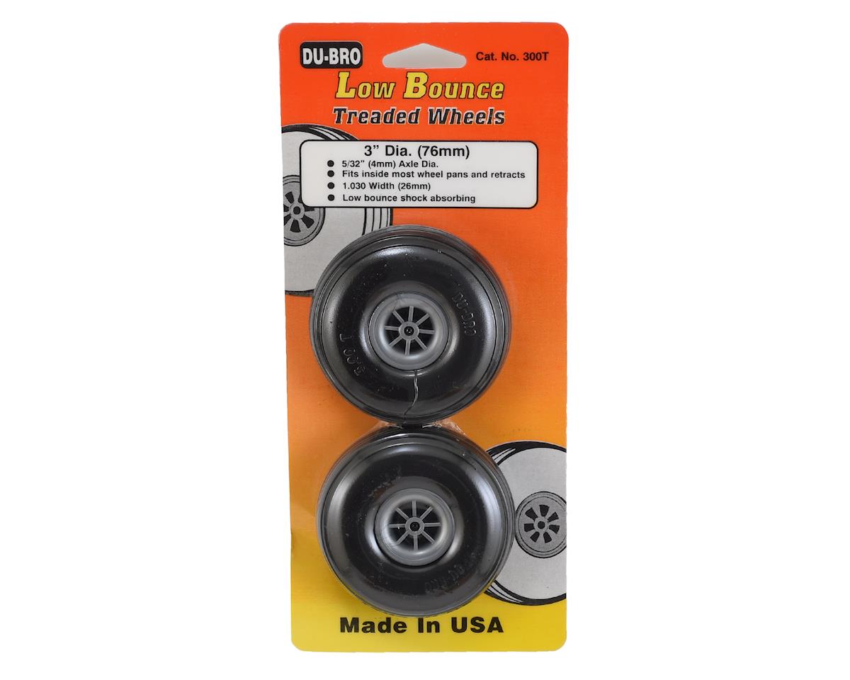 Packaging of Du-Bro low bounce treaded wheels with an orange and yellow design.