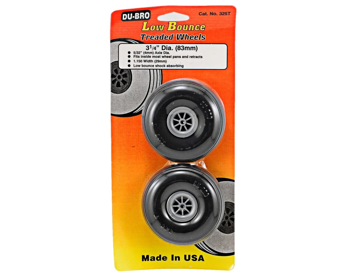 Packaged Du-Bro low bounce treaded wheels with orange and yellow packaging.